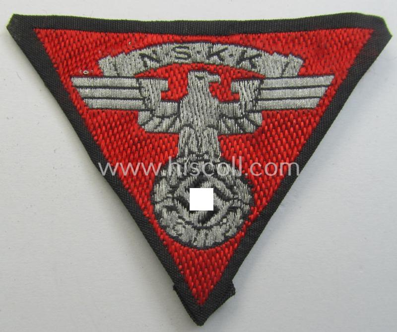 Attractive - and truly used! - so-called: N.S.K.K. (ie. 'National Socialistisches Kraftfahr Korps') side-cap-eagle (ie. 'Adler für Schiffchenmütze') being a 'flat-wire-woven'-example that comes mounted onto a bright-red-coloured background
