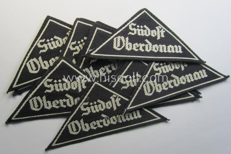 Attractive, 'HJ' ie. 'BDM' ('Bund Deutscher Mädel') district-triangle (ie. 'Gebietsdreieck') entitled: 'Südost Oberdonau' (being a 'virtually mint' example that retains its period-attached, paper-based so-called: 'RzM'-etiket