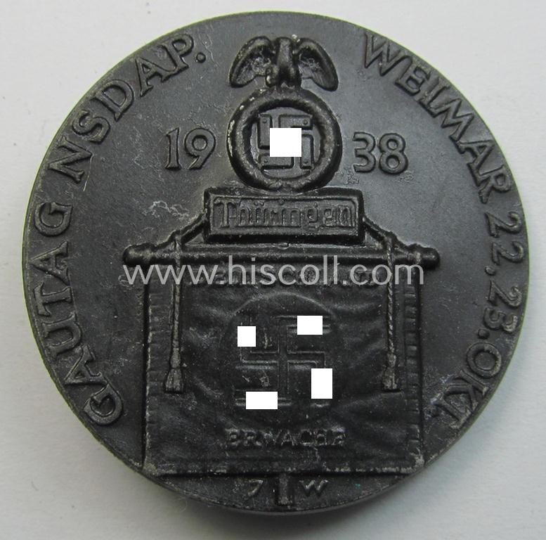 Commemorative, blackened-aluminium-based N.S.D.A.P.-related 'tinnie' depicting a: 'Deutschland Erwache'-banner surrounded by the text: '10 jährige Wiederkehr des Reichsparteitages Weimar - 1938'