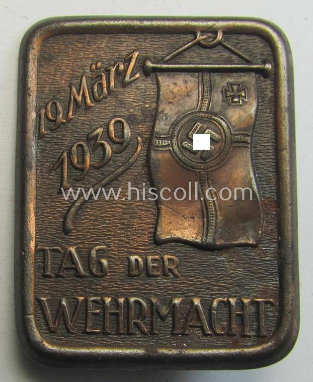 Attractive, reddish-bronze-toned (and I deem) W.H.W.- (ie. 'Winterhilfswerke'-) related day-badge (ie. 'tinnie') as was issued to commemorate a: 'WHW'-gathering ie. rally entitled: 'Tag der Wehrmacht - 19. März 1939'