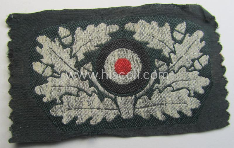 Attractive - and simply never used! - WH (Heeres) officers'-type cocarde (as executed in so-called: 'flat-wire'- ie. 'BeVo'-weave pattern) as was specifically intended for usage on the: 'Knautschmützen o. Alter-Art-Schirmmützen' ie. visor-caps
