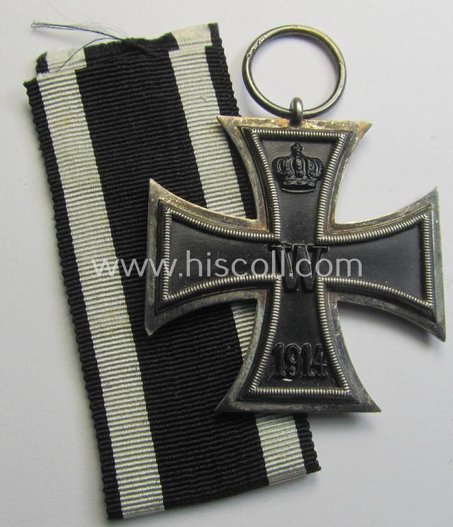 Attractive, WWI-period: 'Eisernes Kreuz II. Klasse' (or: iron cross second class) being a non-maker-marked example that comes together with its (minimally) confectioned piece of ribbon (ie. 'Bandabschnitt')