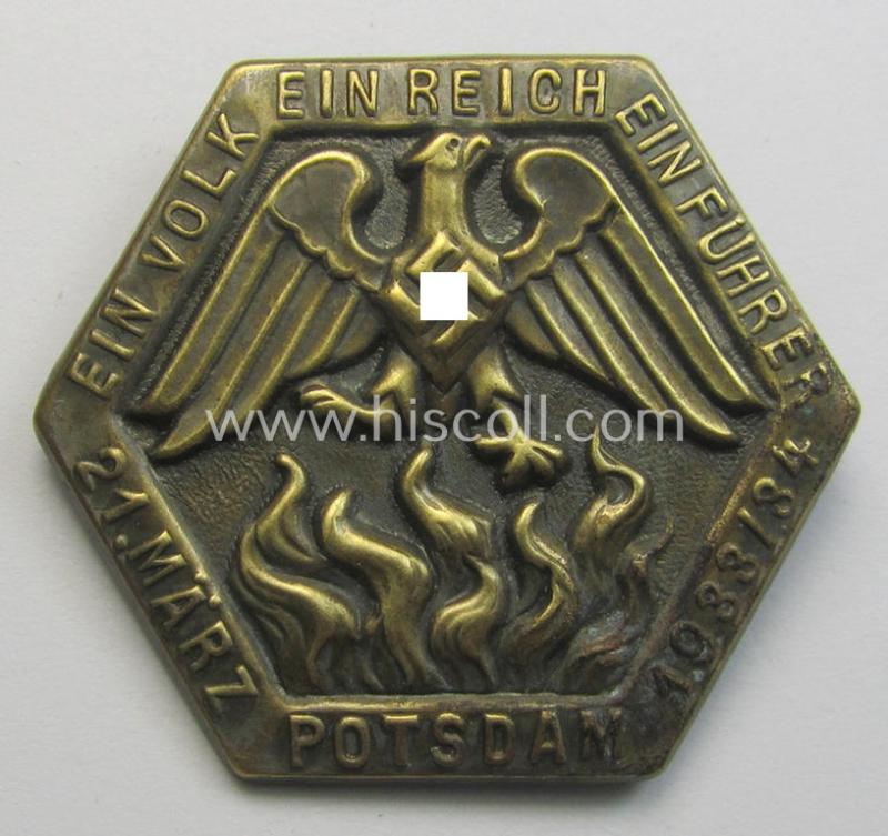 Attractive, golden-toned- (and I deem typical 'Eisenblech'-based) so-called: N.S.D.A.P.-related day-badge (ie. 'tinnie' or: 'Veranstaltungsabzeichen') entitled: 'Ein Volk - Ein Reich - Ein Führer - 21. März - Potsdam - 1933/34'