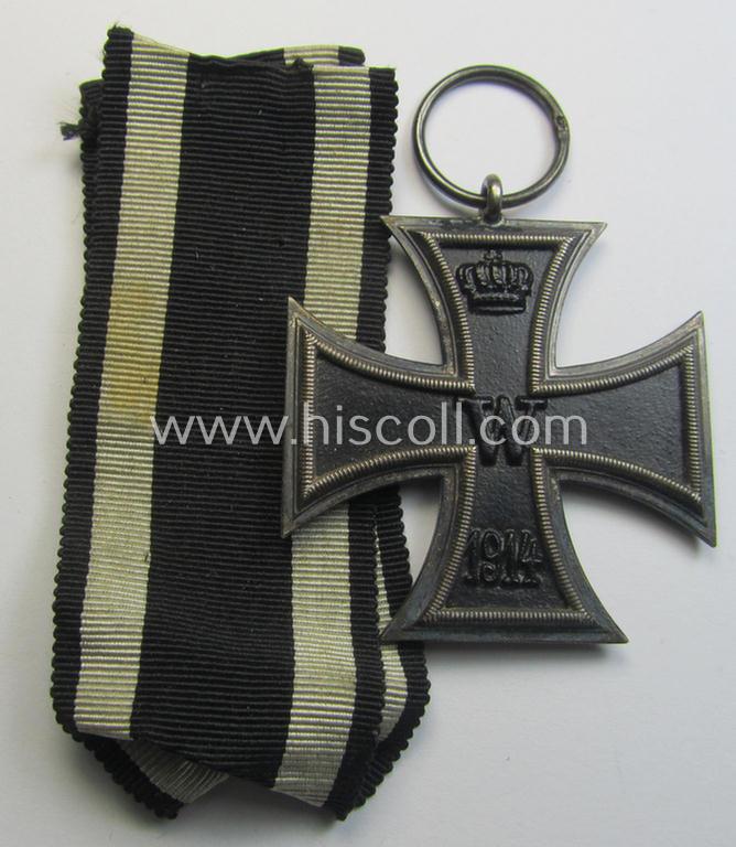 Attractive, WWI-period: 'Eisernes Kreuz II. Klasse' (or: iron cross second class) being a neatly maker- (ie. 'MR'-) marked example that comes together with its (minimally) confectioned piece of ribbon (ie. 'Bandabschnitt')