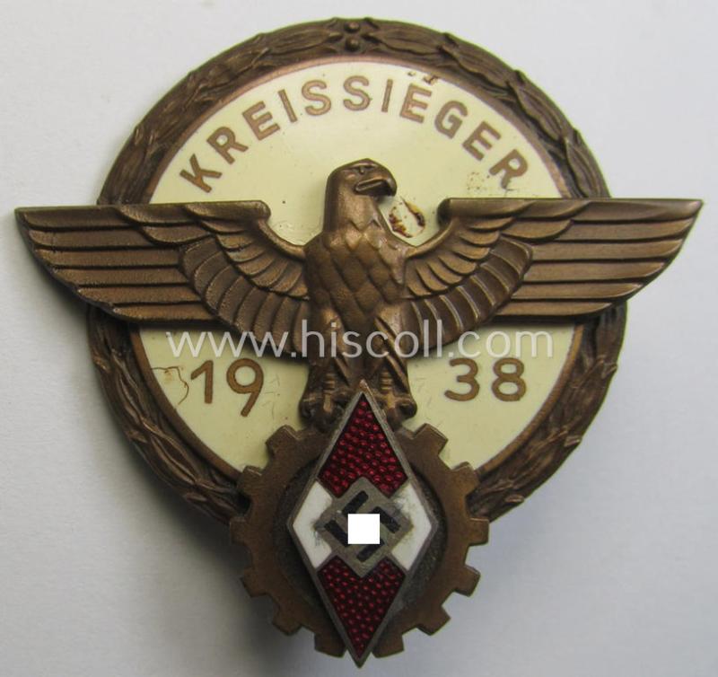 Superb, 'HJ'- ('Hitlerjugend') ie. 'BDM'- ('Bund Deutscher Mädel') related: 'Reichsberufswettkampf-Siegerabzeichen' (of the 2nd model) entitled: 'Kreissieger 1938' and being a neatly maker- (ie.: 'G. Brehmer'-) marked example