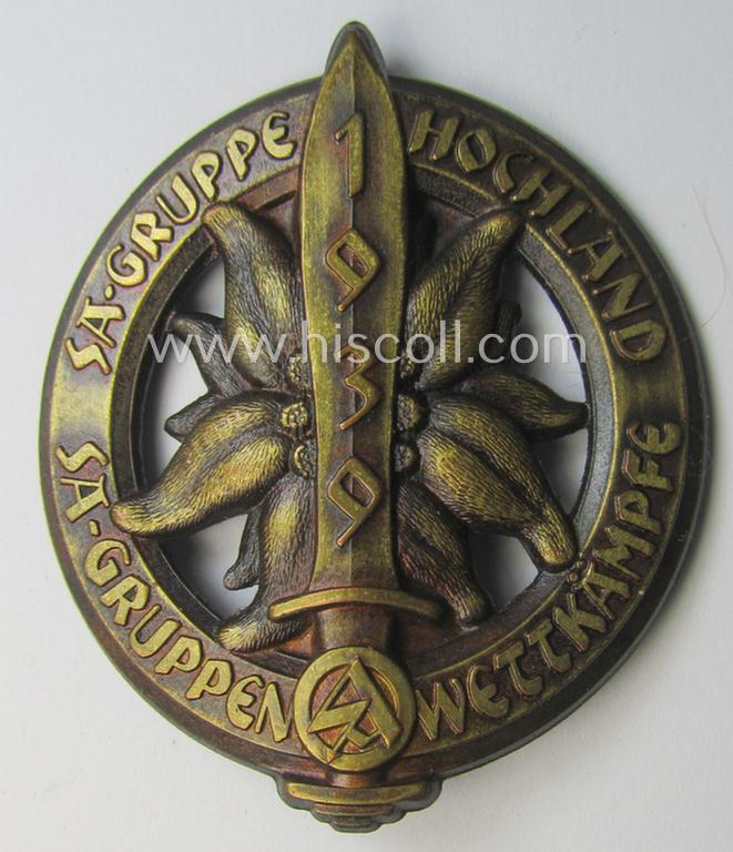 Commemorative, copper-toned- and zinc-based, SA-related 'tinnie', being a maker- (ie. 'Klotz u. Kienast'-) marked example depicting an 'Edelweiss'-flower, sword and SA-logo surrounded by the text: 'SA-Gruppe Hochland - SA-Gruppenwettkämpfe 1939'