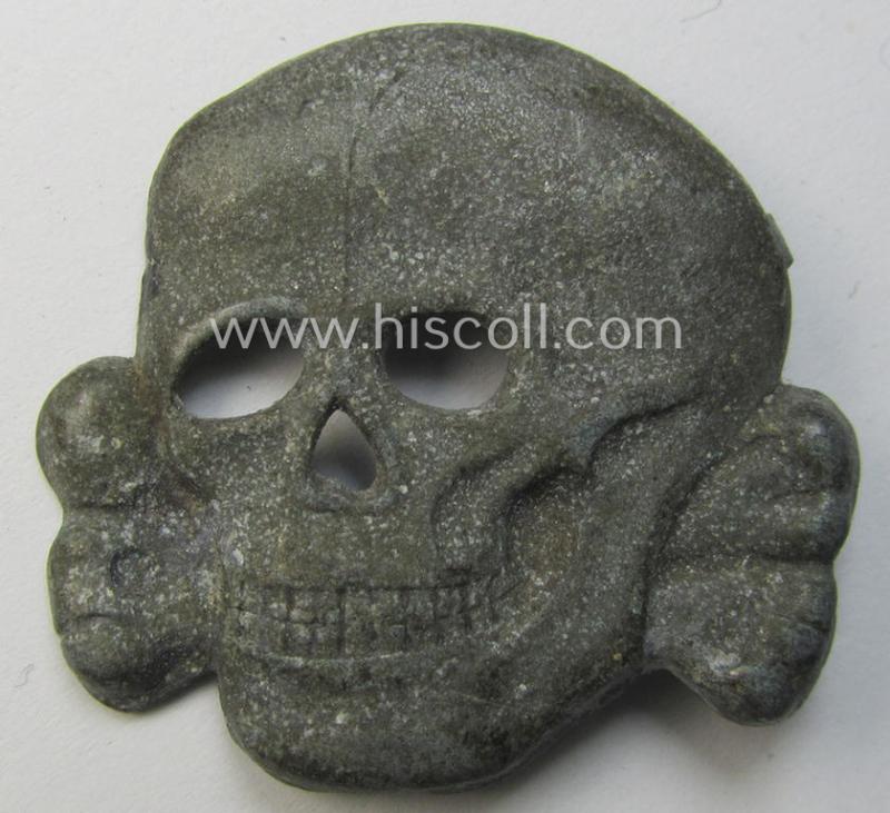 Attractive - albeit regrettably incomplete but nevertheless scarcely encountered! - 'Waffen-SS' visor-cap skull (ie. 'Totenkopf für Schirmmütze') being a detailed- and/or non-maker-marked example as was executed in 'Feinzink'-based metal