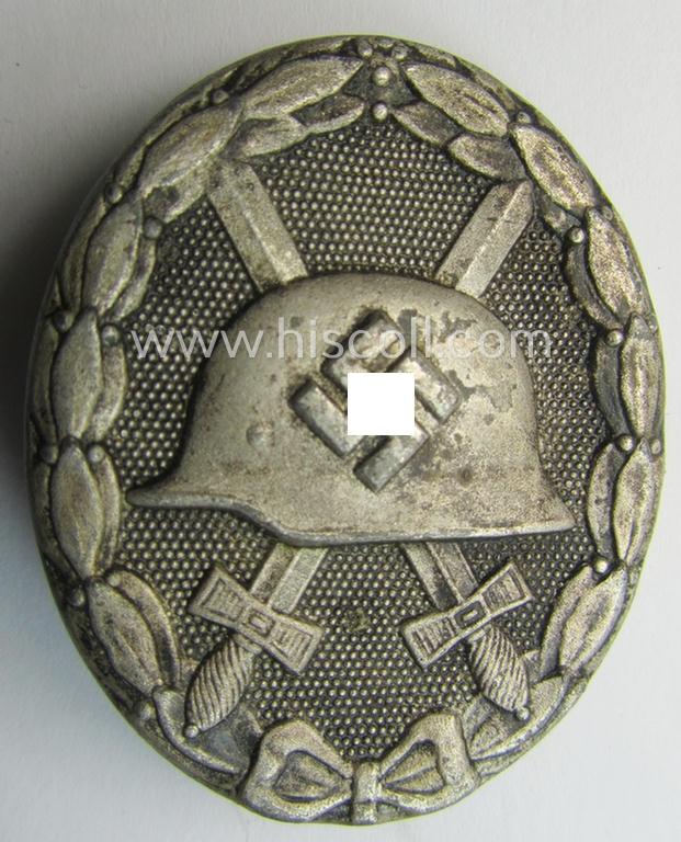 Attractive - and neatly maker- (ie. 'L/11'-) marked! - example of a silver-class wound-badge (or: 'Verwundeten-Abzeichen in Silber') as was produced by the: 'Wilhelm Deumer'-company