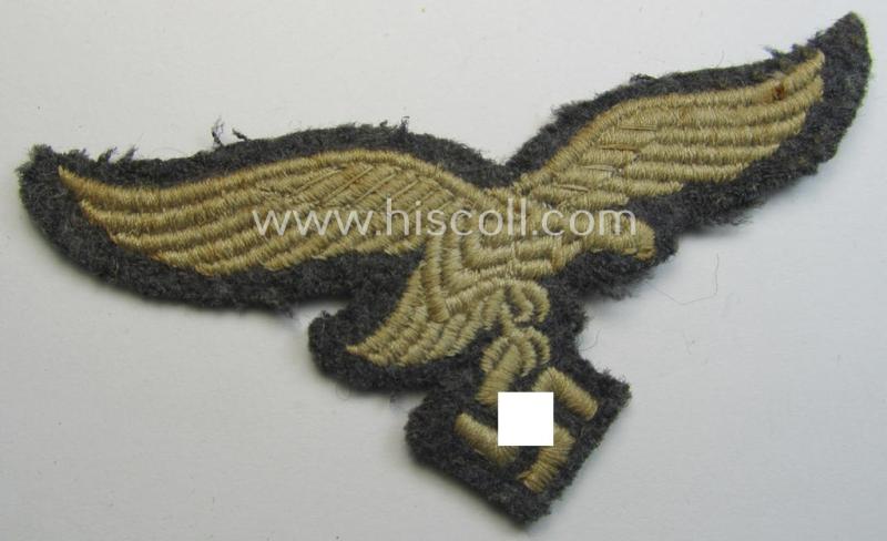 Attractive - and clearly used- ie. carefully tunic-removed! - WH (Luftwaffe) EM- (ie. eventually NCO-) type breasteagle (being a once tunic-attached example as executed in typical machine-embroidered-pattern)