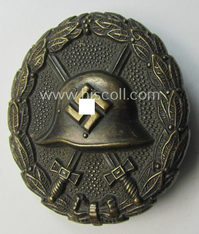 Attractive, early-pattern, black-class wound-badge (ie.: 'Verwundeten Abzeichen in Schwarz') being a detailed so-called: 'Spanish Civil-War'-version that comes in a moderately used- and/or worn, condition