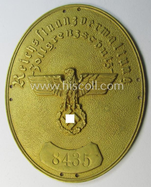 Attractive - bright-golden-toned- and/or metal-based - so-called: 'Reichsfinanzverwaltung-Zollgrenzschutz'-related armshield being a hardly used example that is bearing the stamped (unique) serial-number: '8435'