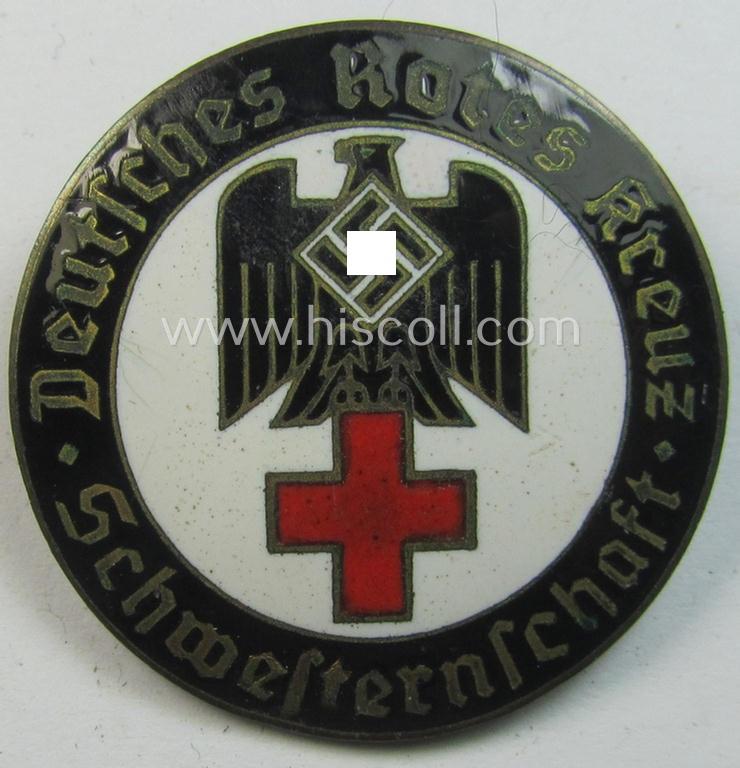 Superb, DRK (ie. 'Deutsches Rotes Kreuz') so-called: nurses'-badge entitled: 'Schwesternschaft' being a medium-sized version showing an engraved bearers'-number: ('401'), town: ('Stuttgart') and/or makers'-mark ('A. Stübbe - Berlin')