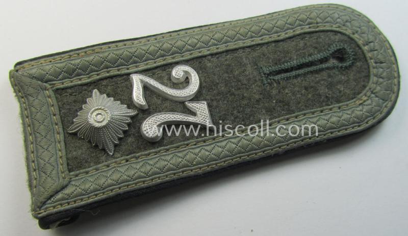 Single, later-war-period so-called: 'M44'-pattern, simplified and 'cyphered' WH (Heeres) NCO-type shoulderstrap as piped in the black-coloured branchcolour as was intended for usage by a: 'Feldwebel des Pionier-Abteilungs 27'