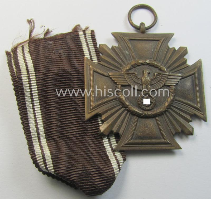 Attractive, 'N.S.D.A.P. Dienstauszeichnung in Bronze' (ie. '3. Stufe für 10 Jahre t. Dienste') being a (typical) non-maker-marked- (and 'regular-weight'!) example that comes together with its period ribbon (ie. 'Bandabschnitt')