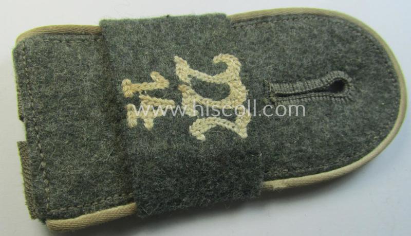 Attractive - albeit regrettably single! - later-war-period- (ie. 'M44 o. M45'-pattern-) WH (Heeres) EM-type shoulderstrap that comes with its attached 'Übershube' as was intended for a: 'Soldat des Inf.-Maschinengewehr-Abts. 14'