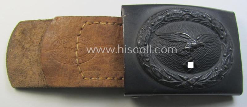 Very attractive, WH (Luftwaffe) blue-coloured- and/or steel-based belt-buckle, being a neatly maker- (ie. 'Berg & Nolte'-) marked and '1941'-dated example that comes mounted onto its period, natural-coloured and/or leather-based tab