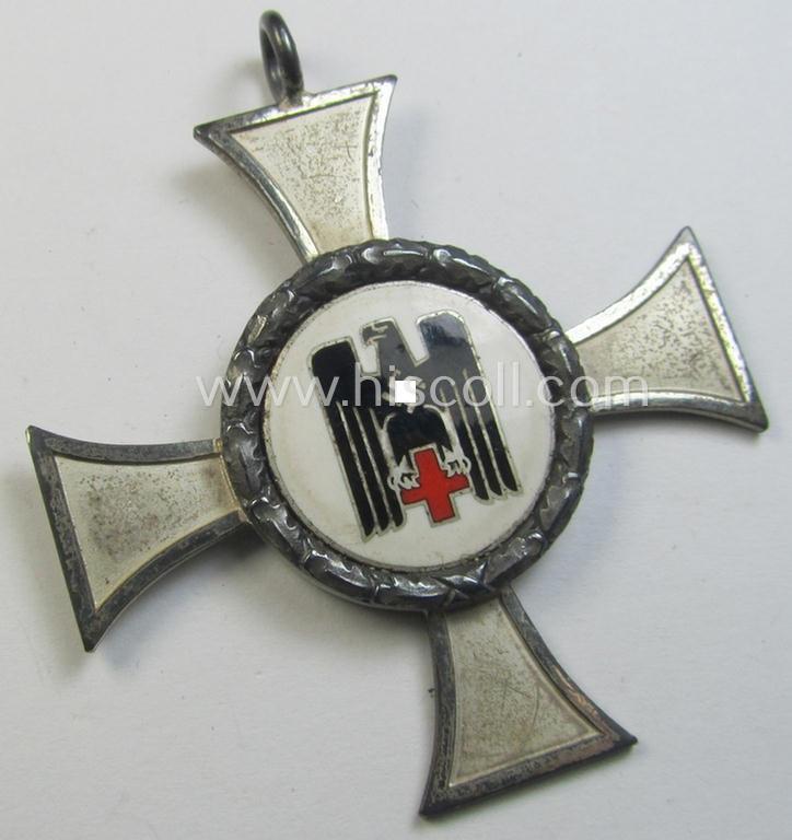 Superb - nicely enamelled and actually scarcely found! - so-called: 'DRK-Schwesternkreuz für 25 Dienstjahre des 2. Modell' that comes as issued and/or stored for decades