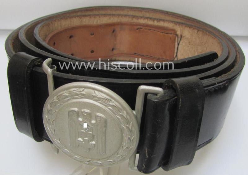 Superb - and rarely encountered! - DRK (ie. 'Deutsches Rotes Kreuz') aluminium-based, officers'-type belt-buckle (ie. 'Koppelschloss für Führer des DRK') being a  maker- (ie. 'Ges.Gesch. 2'-) marked example that came mounted onto its period belt