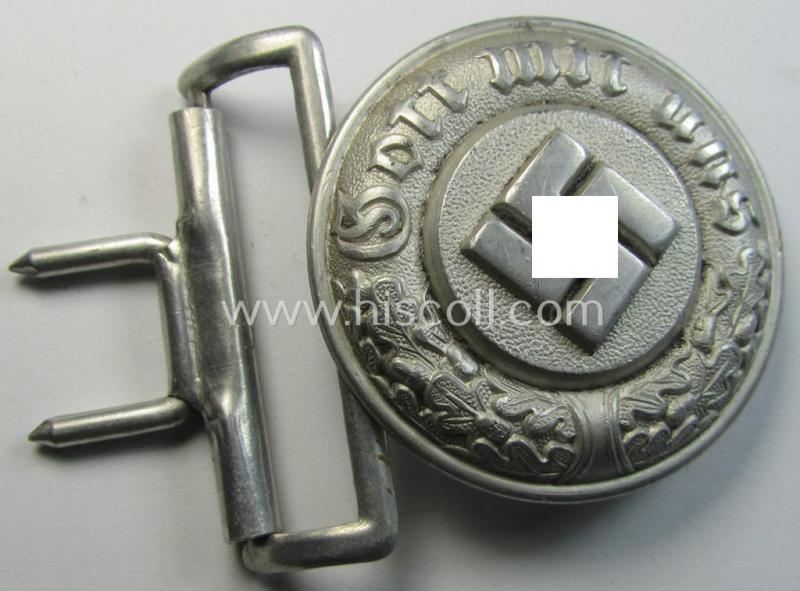 Attractive, police- (ie. 'SS-Polizei') aluminium-based, officers'-pattern belt-buckle (ie. 'Koppelschloss für Offiziere der SS, Polizei o. Gendarmerie') being a maker- (ie. 'OLC'-) marked example that comes in a moderately used- ie. worn, condition