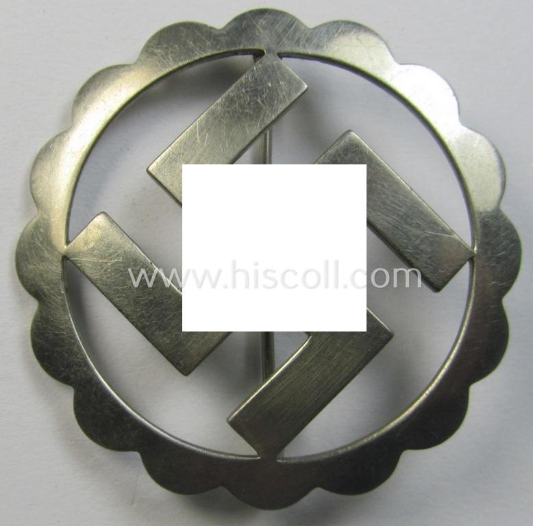 Attractive - and unusually seen! - bright silver-toned (and - I deem - typical 'nickle-chrome'-based) so-called: patriotic swastika-brooch (ie. 'N.S.D.A.P.-supportive piece) being an example that comes mounted onto its functional pin