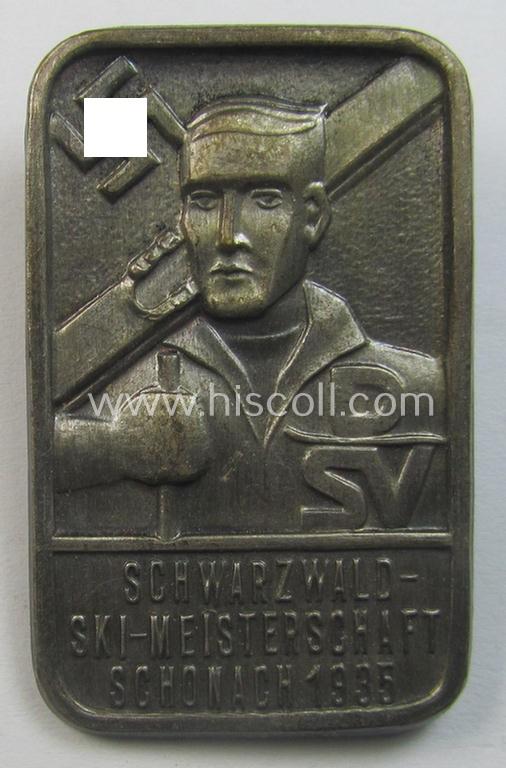 Attractive, silverish-toned: 'Deutscher Ski Verband'- (ie. 'D.S.V.'-) related day-badge (ie. 'tinnie' or: 'Veranstaltungsabzeichen') as was issued to commemorate the: 'D.S.V. Schwarzwald-Ski-Meisterschaft - Schonach - 1935'
