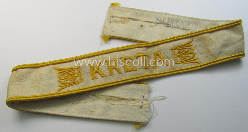 Superb, WH cuff-title (ie. 'Ärmelstreifen') entitled: 'Kreta' (being an example that bears a printed 'RbN.'-numeral) and that comes in a surely issued albeit simply never worn nor once tunic-attached, condition