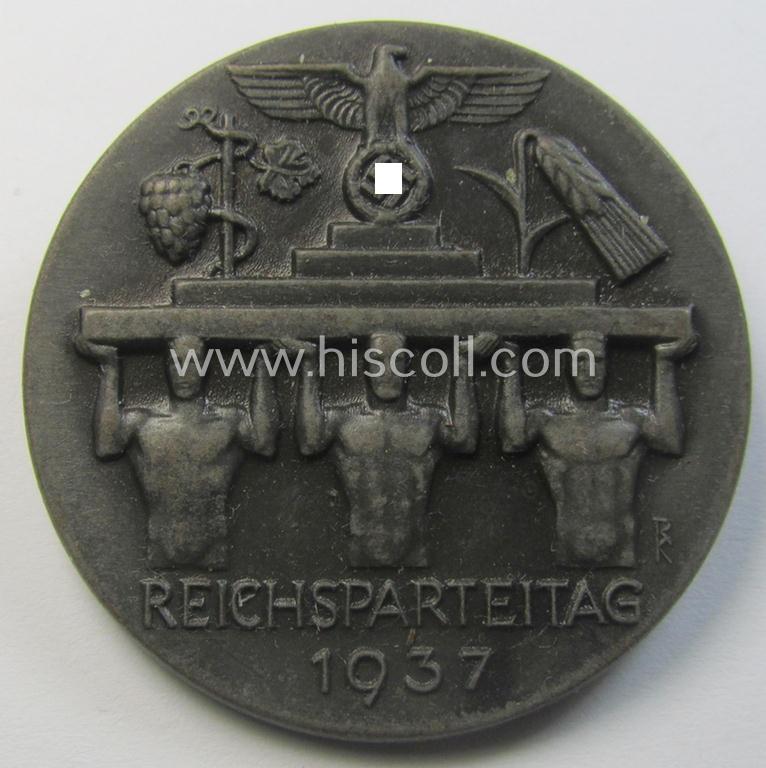 Greyish-toned - and fairly luxuriously styled! - so-called: N.S.D.A.P.-related 'tinnie' (ie. 'Tagungs- o. Veranstaltungsabzeichen'-) being a neatly-maker- (ie. 'Ferd. Wagner'-) marked example, showing the text: 'Reichsparteitag 1937'