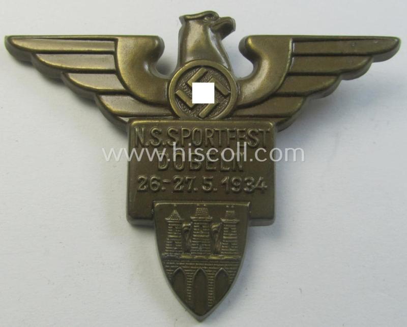 Attractive, golden-bronze-toned and/or: sports'-related day-badge (ie. 'tinnie') as was issued to commemorate a locally-held: 'Athletics'-competition entitled: 'N.S. Sportfest - Döbeln - 26.-27.-5-1934'