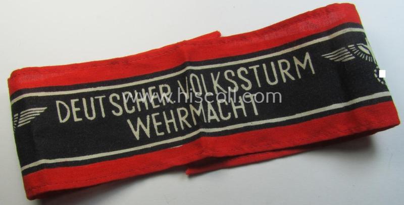 Superb, typically printed- and/or later-war-period, bright-red- and/or black-coloured so-called: 'Deutscher Volkssturm'-armband (ie. 'Armbinde') that comes in an overall very nice- (I deem issued- albeit never used- nor worn-), condition