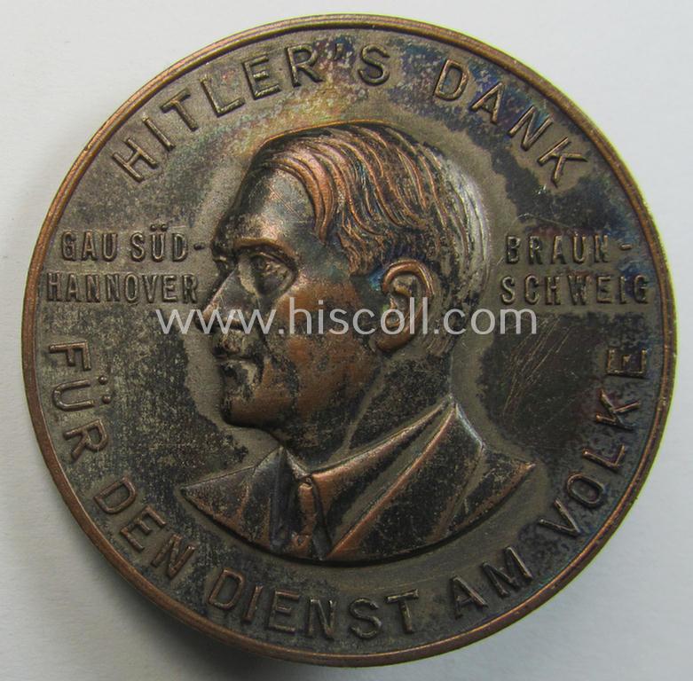 Commemorative, reddish-bronze-toned, 'Buntmetall'-based N.S.D.A.P.- (ie. WHW-) related 'tinnie' being a maker- (ie. 'Paulmann u. Crone'-) marked example depicting Adolf Hitler and showing the text: 'Hitler's Dank für den Dienst am Volke'