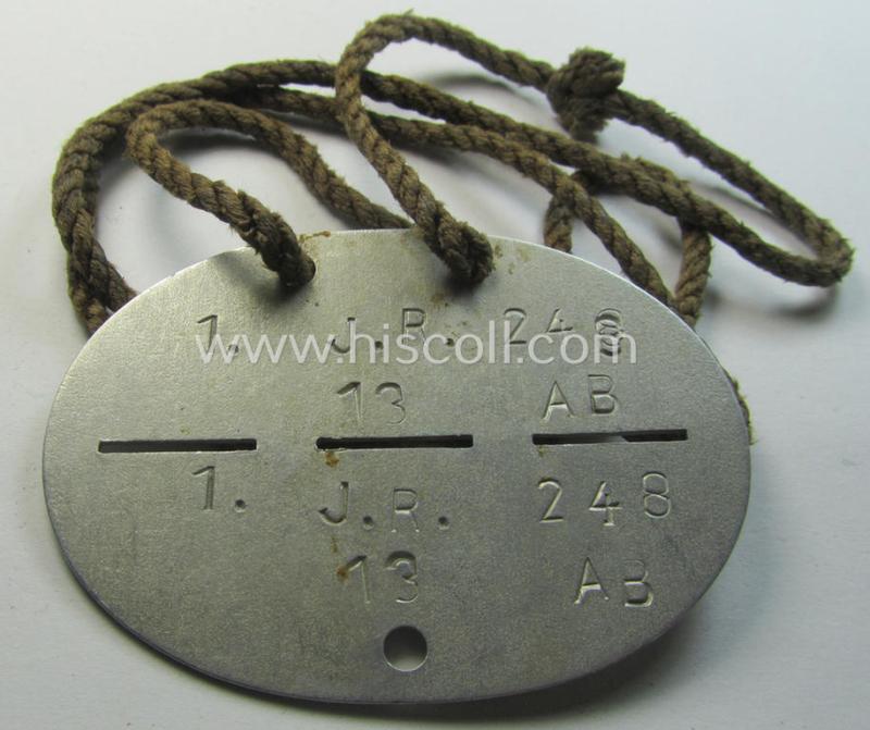 WH (Heeres) ie. 'Infanterie'-related ID-disc: '1.J.R. 248' on its period cord