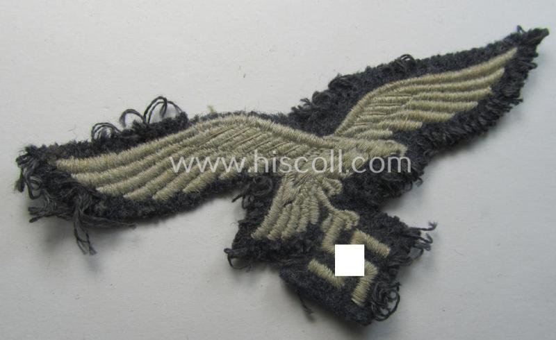 Moderately used- (ie. carefully tunic-removed) WH (Luftwaffe) EM- (ie. eventually NCO-) type breasteagle (being a once tunic-attached example as executed in typical machine-embroidered-pattern)