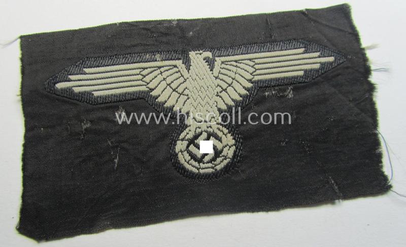 Mid- (ie. later-war-) pattern, 'SS' (ie. 'Waffen-SS') so-called: 'BeVo-weave-style', enlisted-mens'- ie. NCO-pattern arm-eagle (ie. 'Ärmeladler für Mannschaften u. Unterführer') as was intended for usage by the various Waffen-SS troops