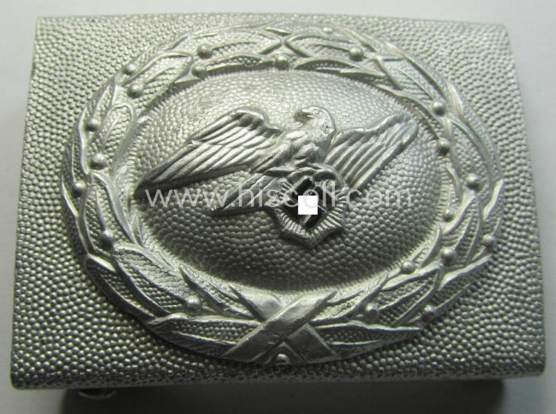 Superb - and truly unusually encountered! - RLB (ie. 'Reichsluftschutz-Bund'), aluminium-based, EM-type belt-buckle (of the second pattern) being a clearly maker- (ie. 'R.L.B. Ges.Gesch. - Overhoff & Cie.'-) marked example