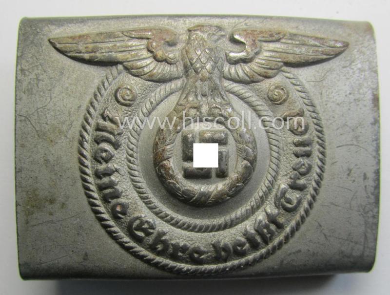 Waffen-SS enlisted-mens'- (ie. NCO-) type belt-buckle (being a typical, unmarked and typical steel-based: 'Overhoff & Cie'-example) that comes in a surely issued- and/or just moderately used- ie. worn, condition
