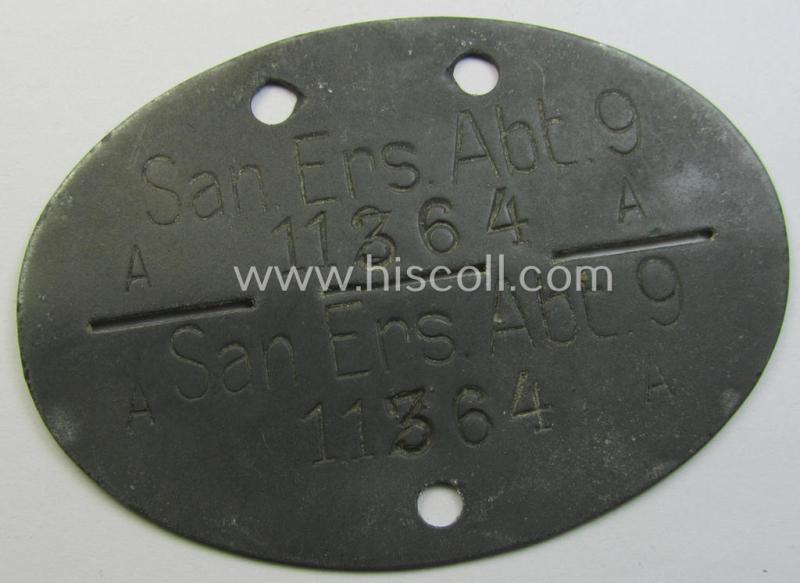 WH (Heeres) ie. 'Sanitäter'-related ID-disc bearing the clearly stamped unit-designation that simply reads: 'San.Ers.Abt. 9' and that comes as issued- and/or worn