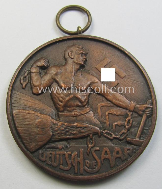WHW- (ie. 'Winterhilfswerke'-) related commemorative shooting-contest medal entitled: 'Deutsch die Saar - Opferschiessen - W.H.W. - 24.3.1935'