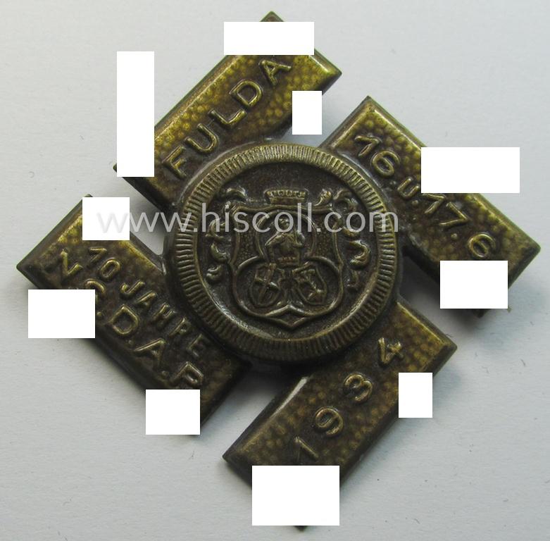 Commemorative, golden-bronze-toned N.S.D.A.P.-related day-badge (ie. 'tinnie' or: 'Veranstaltungsabzeichen') as was issued to commemorate participation within an event named: '10 Jahre N.S.D.A.P. - Fulda - 16. u. 17.6.1934'
