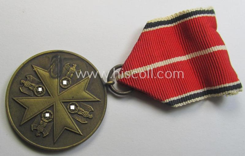 'Deutsche Bronzene Verdienstmedaille des Deutschen Adler Ordens ohne Schwn.' being a '30'-marked example