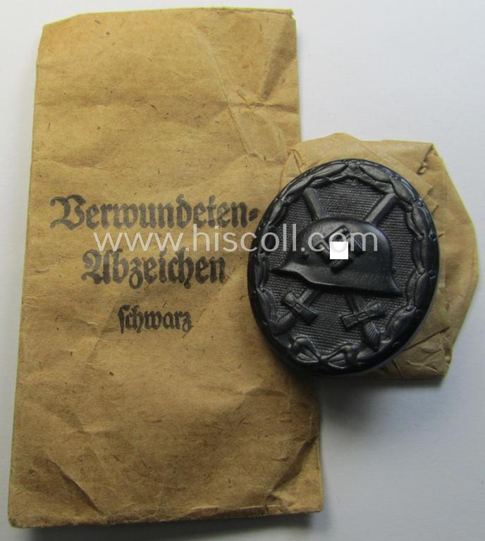 'Verwundeten-Abzeichen in Schwarz' being a non-maker-marked example by the: 'Klein & Quenzer'-company that came stored its period pouch