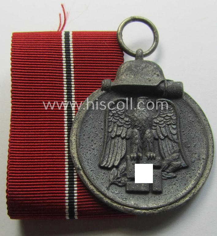 Medal-set: 'Winterschlacht im Osten 1941-42' being a maker- (ie. '18'-) marked specimen by the maker: 'Karl Wurster'