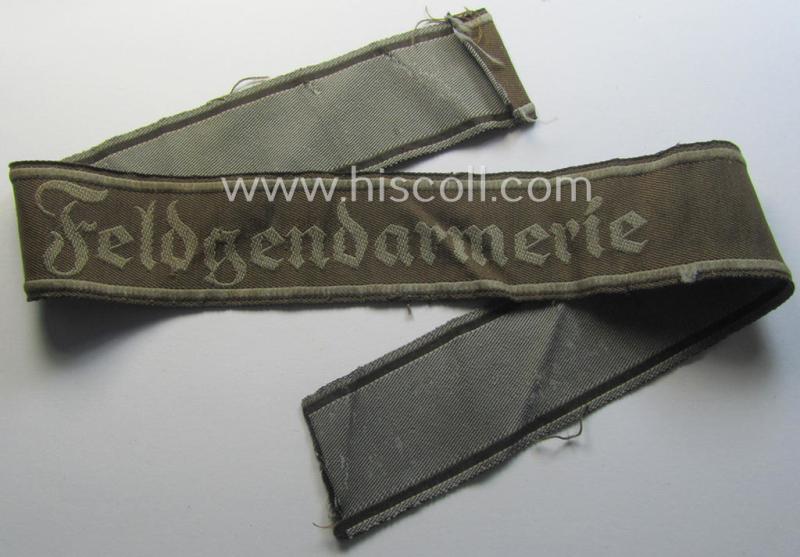 WH (Heeres) cuff-title ie. armband (ie. 'Ärmelstreifen') entitled: 'Feldgendarmerie' (being a typical 'BeVo'-woven example)