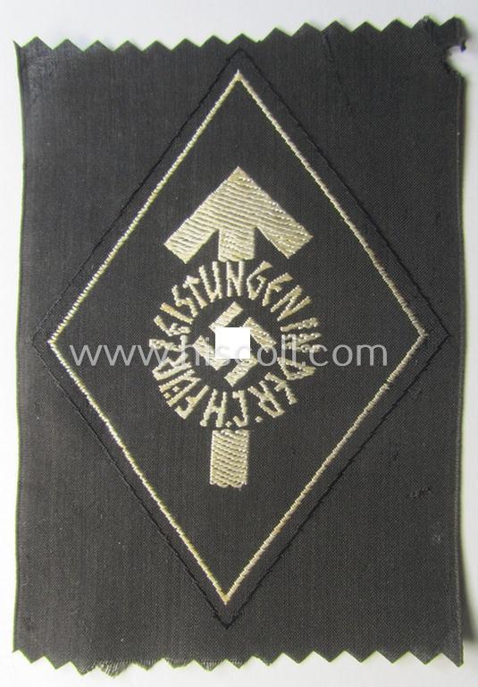 HJ- (ie. 'Hitlerjugend') 'Leistungsabzeichen in Silber in Stoff' that retains its 'RzM'-etiket