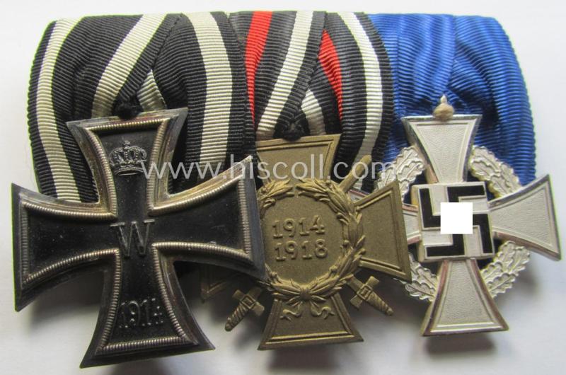 3-pieced 'WWI'- (ie. TR-) related medal-bar (ie. 'Ordenspange') resp. depicting a WWI-period: 'EK II.Kl.', a: 'FKK 1914-18' and a: 'TD-Ez. der 2. Kl.'
