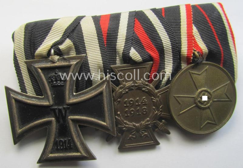 3-pieced 'WWI'- (ie. TR-) related medal-bar (ie. 'Ordenspange') resp. depicting a WWI-period: 'EK II.Kl.', a: 'FKK 1914-18' and a: 'KvK Medaille 1939'