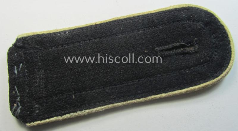 Single, Waffen-SS, EM-type shoulderstrap as piped in the white-coloured branchcolour: 'SS-Mann der Infanterie-Trpn.'