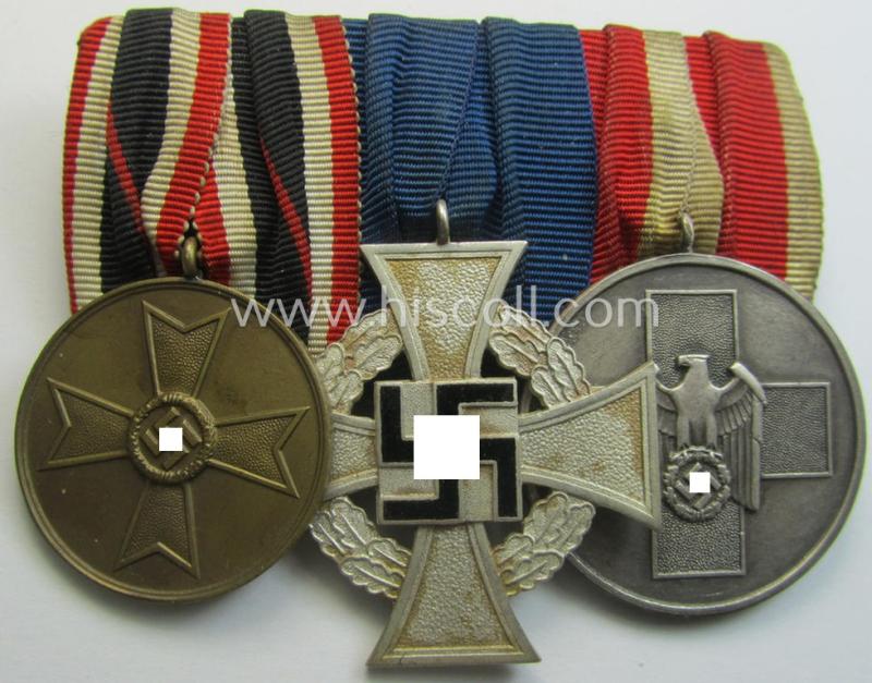 3-pieced, TR-period related medal-bar (ie. 'Ordenspange') resp. depicting a: 'KvK Medaille 1939', a: 'TD-Ez. der 2. Kl.' and a: 'Deutsche Volkspflege'- (ie. civil-service-) medal