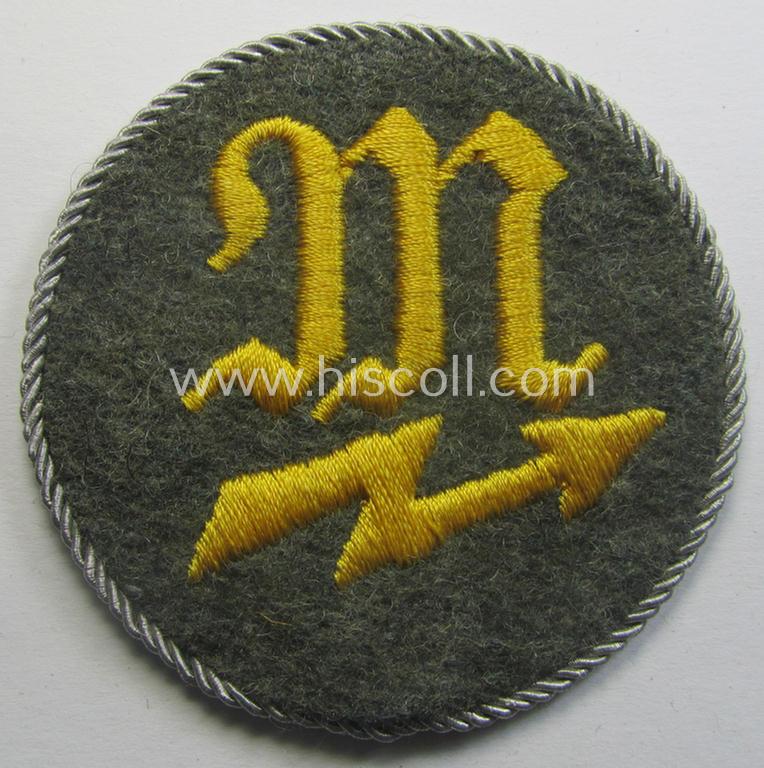 Later-war period, WH (Heeres) machine-embroidered trade- and/or special career patch having a silverish-grey-toned 'Kordel' attached: 'geprüfter Nachrichtenmechaniker-Unteroffizier' (or: qualified signals-mechanic ie. NCO)