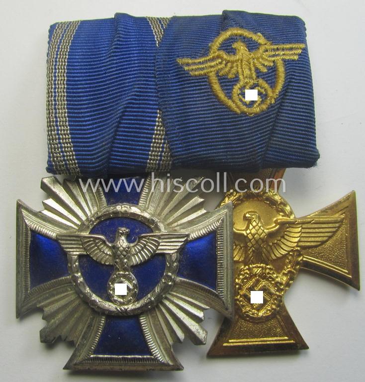 2-pieced, N.S.D.A.P.- and/or: 'Polizei'-related) medal-bar (ie. 'Spange') showing resp. a: 'N.S.D.A.P.-D.A. in Silber' (ie. '2. Stf. für 15 Jahre t.D.') and 'Pol.-Dienstauszeichnung 1. Stf.' that both come period-mounted as a: 'Doppelspange'