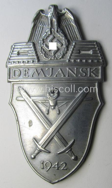 Nicely preserved - albeit regrettably incomplete ie. relic! - example of a WH (Heeres ie. Waffen-SS) 'Demjansk'-campaign-shield as executed in typical magnetic, so-called: 'Eisenblech'